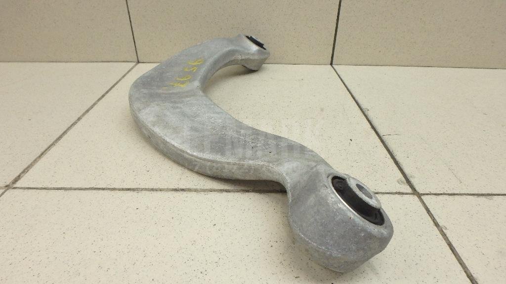 Рычаг задний верхний левый