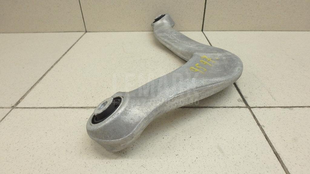 Рычаг задний верхний левый