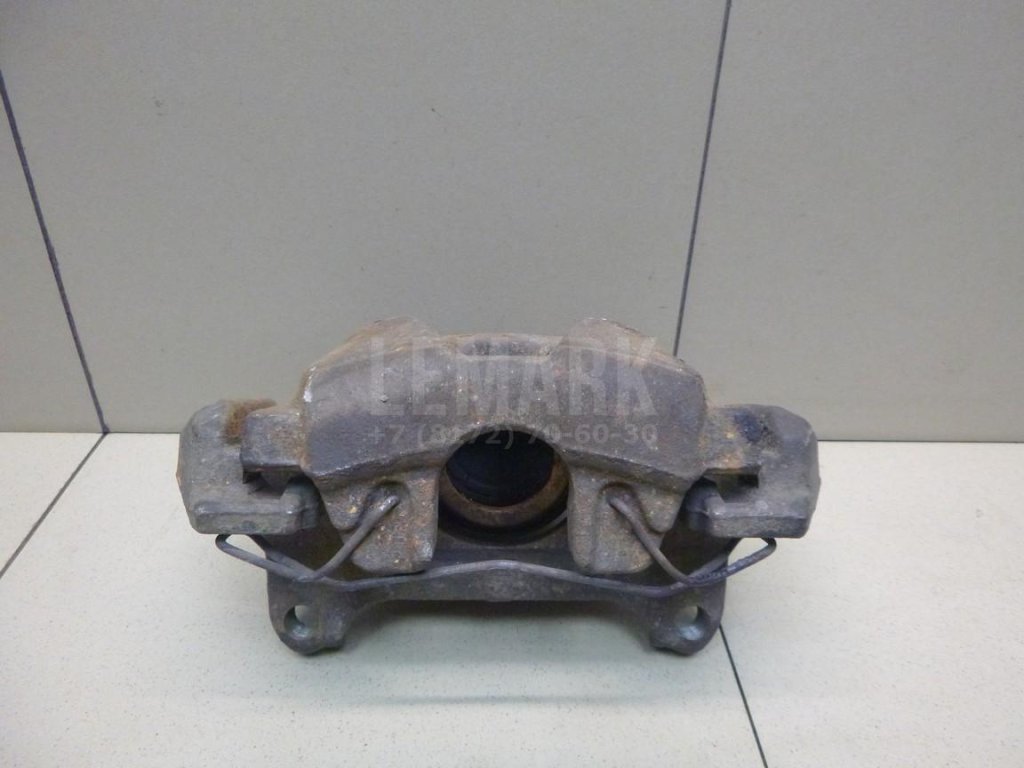 Суппорт тормозной передний левый