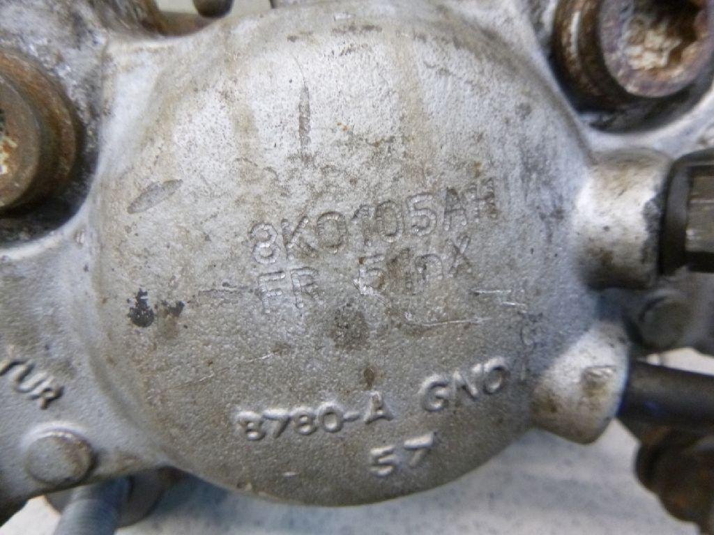 Суппорт тормозной передний левый