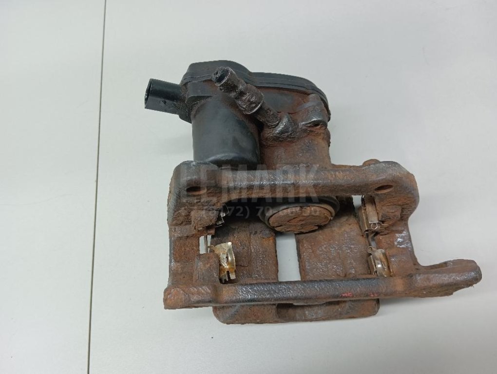 Суппорт тормозной задний левый