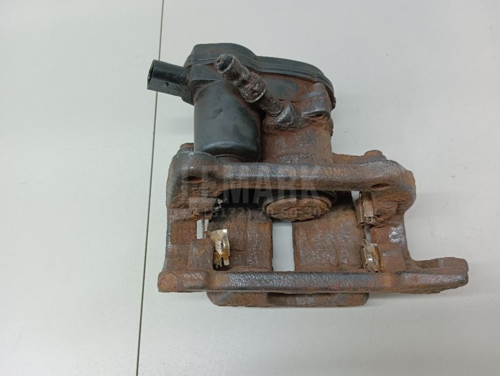 Суппорт тормозной задний левый