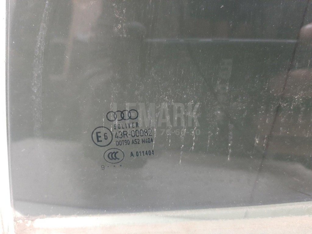 Стекло двери задней левой
