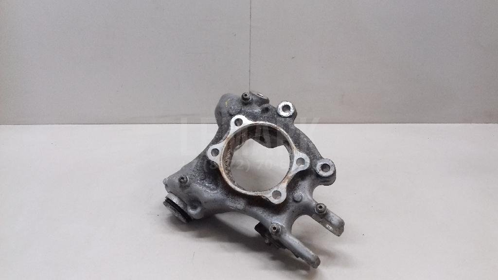 Кулак поворотный задний левый