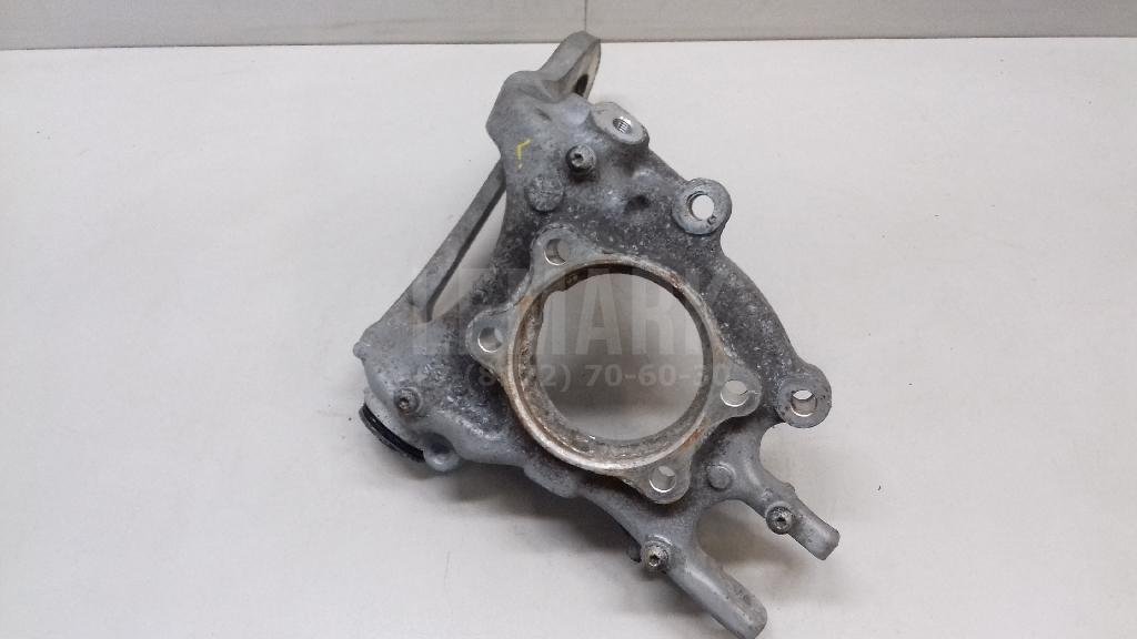 Кулак поворотный задний левый