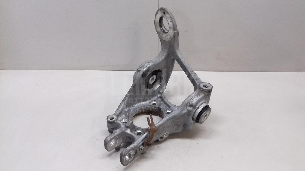 Кулак поворотный задний левый