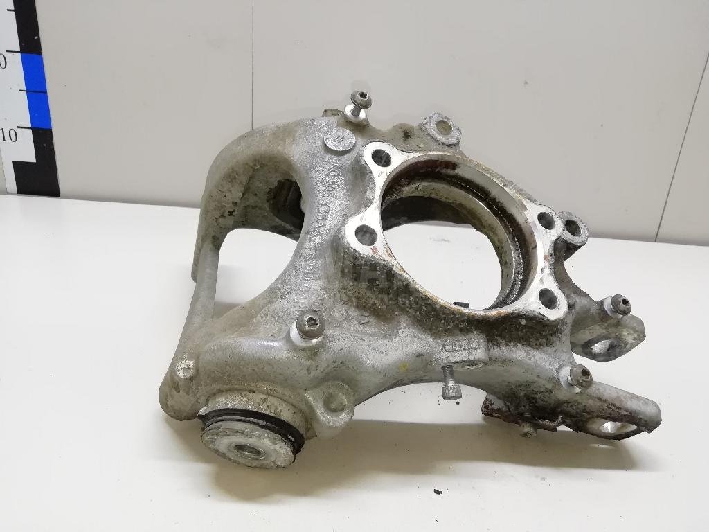 Кулак поворотный задний левый