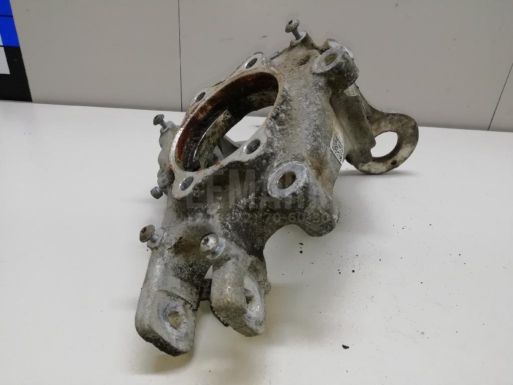 Кулак поворотный задний левый