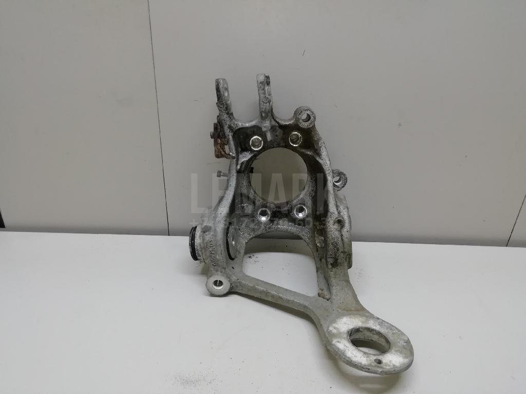 Кулак поворотный задний левый