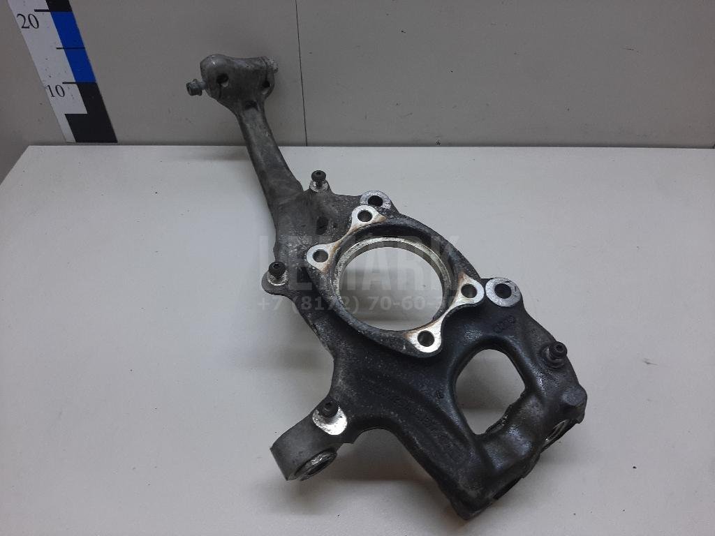 Кулак поворотный передний левый