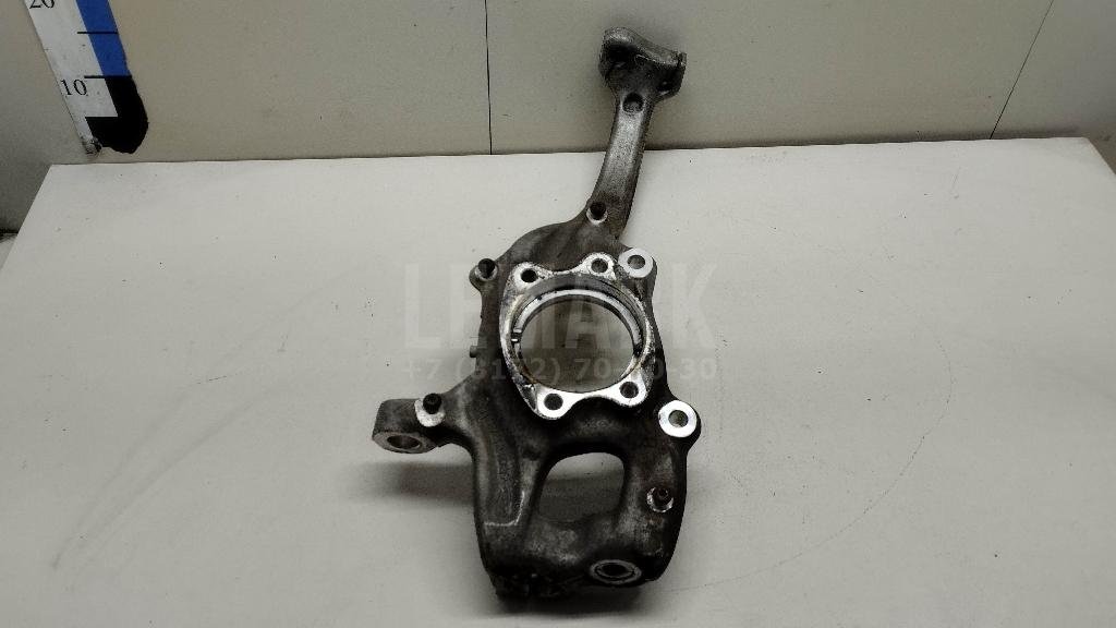 Кулак поворотный передний левый