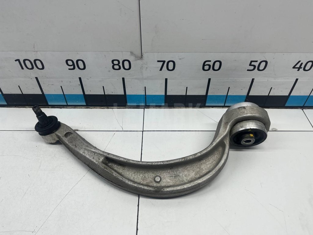 Рычаг передний нижний левый задний