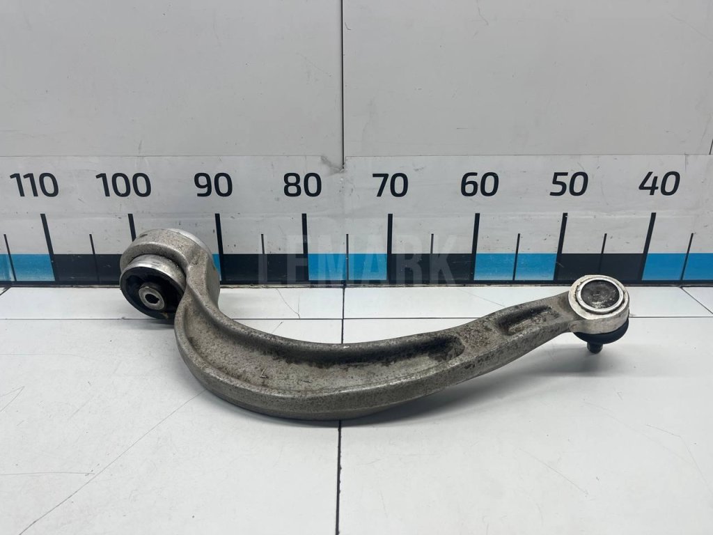Рычаг передний нижний левый задний