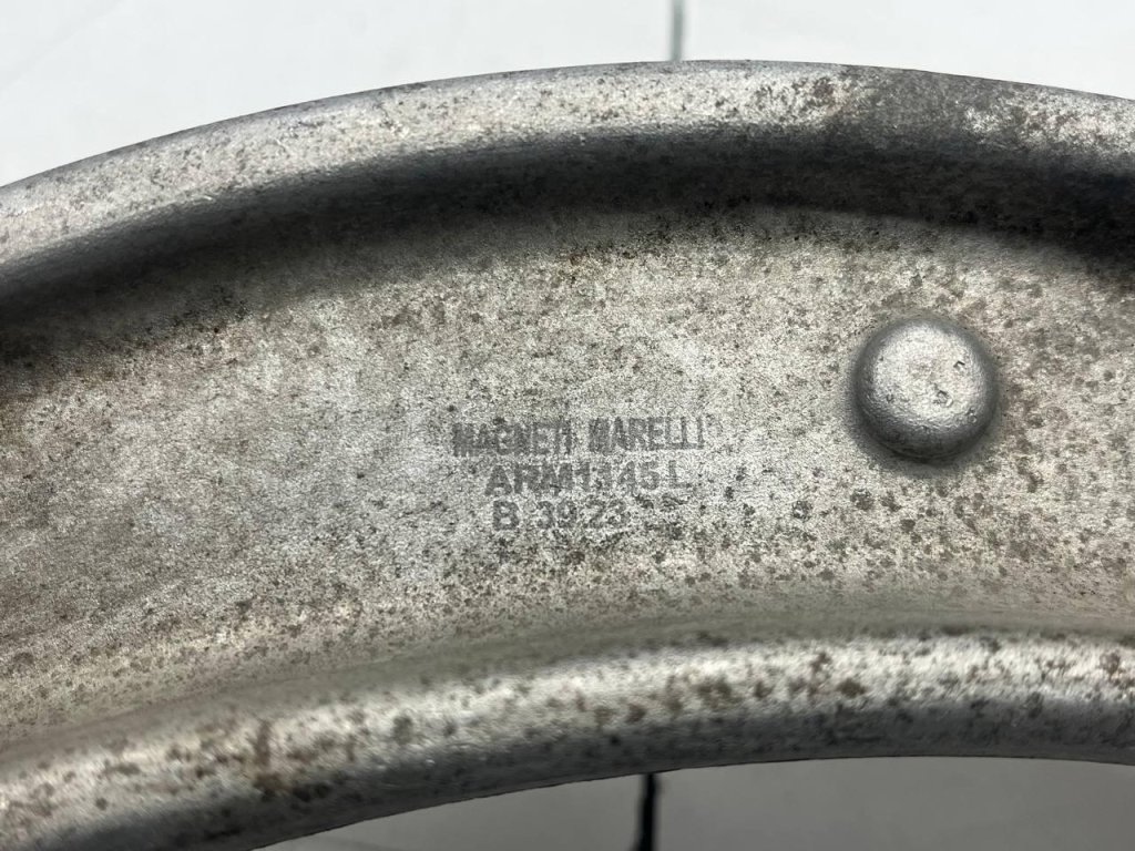 Рычаг передний нижний левый задний