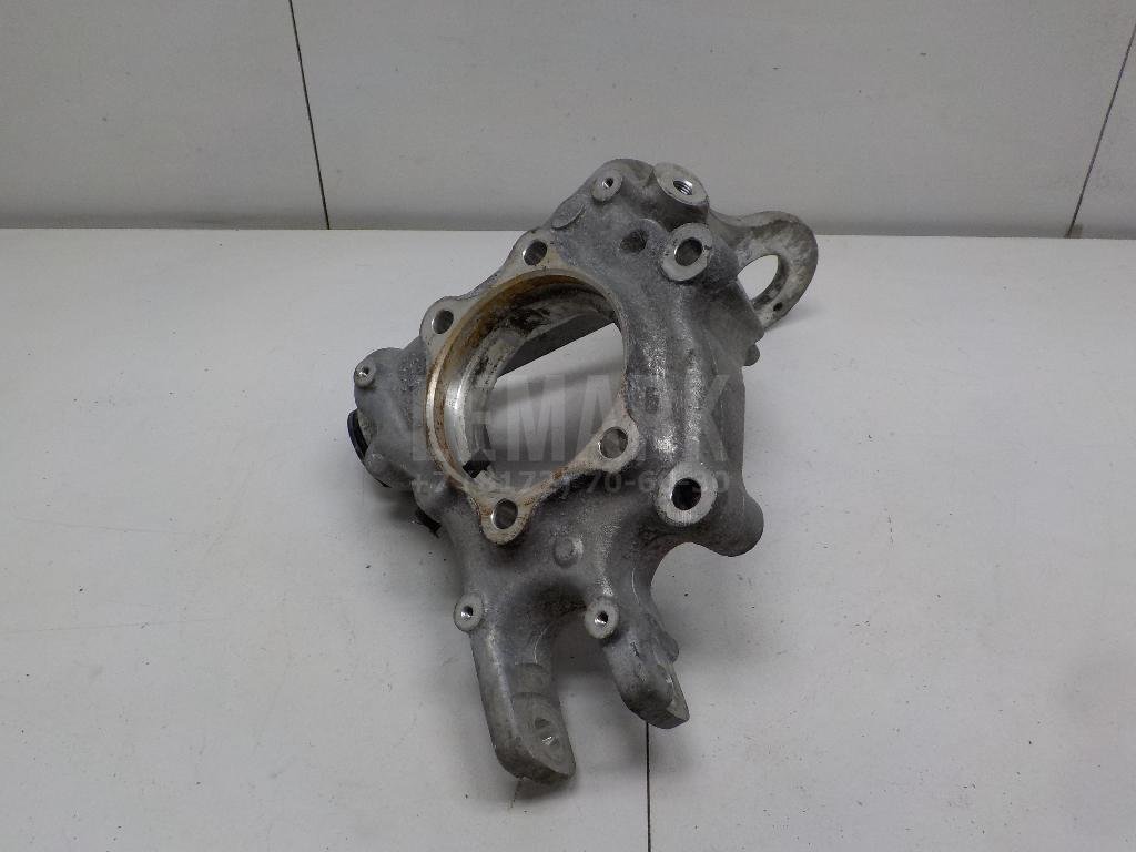 Кулак поворотный задний левый