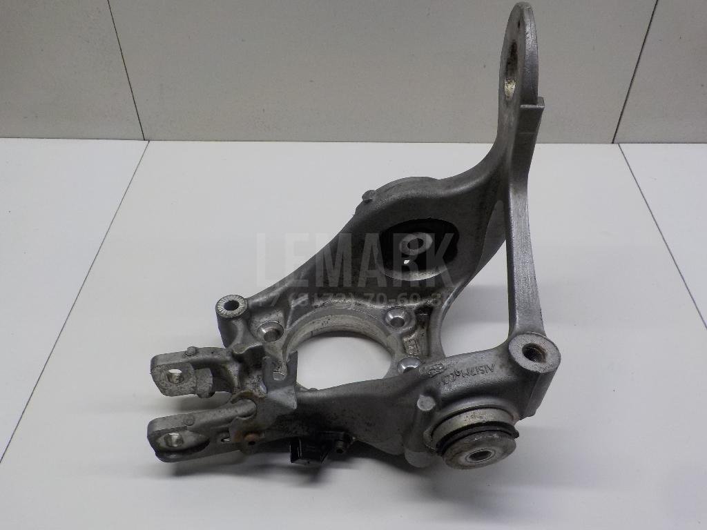 Кулак поворотный задний левый