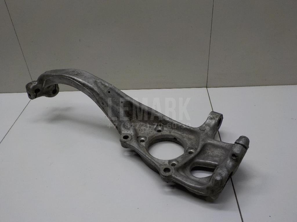 Кулак поворотный передний левый