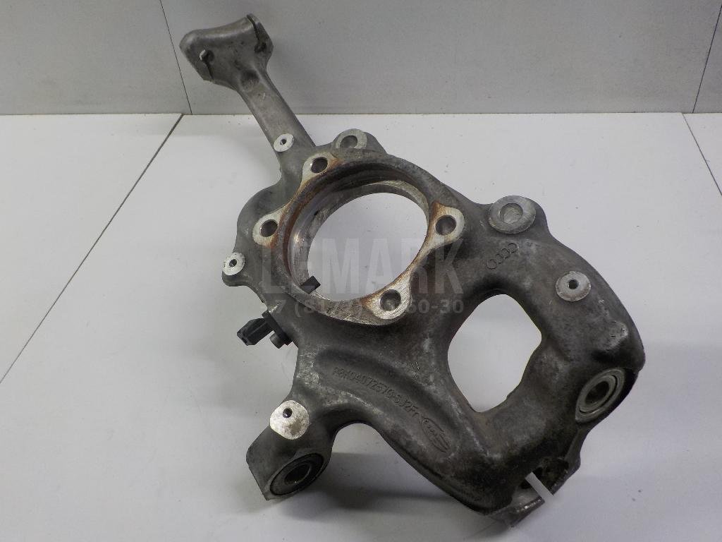 Кулак поворотный передний левый