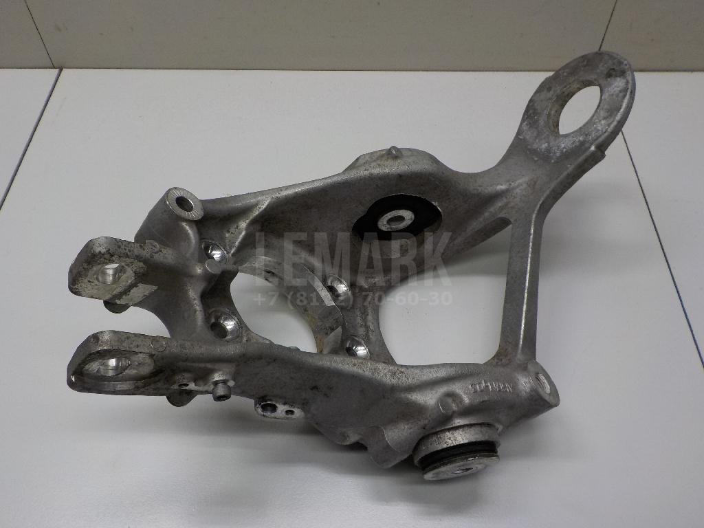 Кулак поворотный задний левый