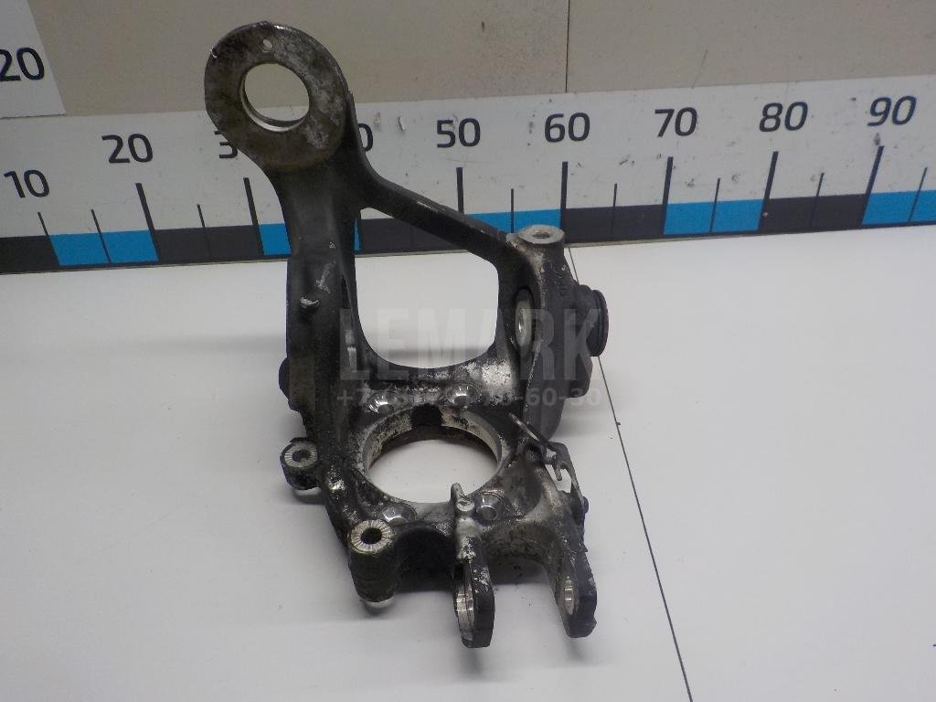 Кулак поворотный задний левый