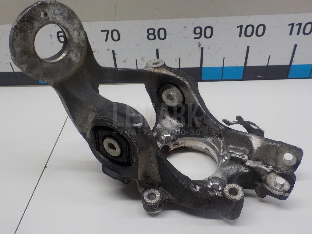 Кулак поворотный задний левый