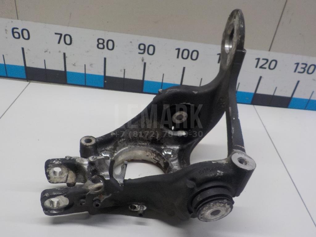 Кулак поворотный задний левый