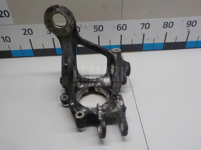 Кулак поворотный задний левый