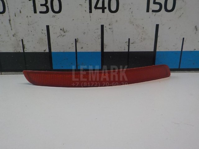 Отражатель в бампер задний левый