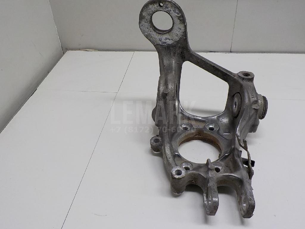 Кулак поворотный задний левый