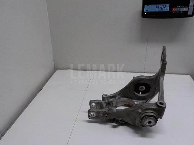 Кулак поворотный задний левый