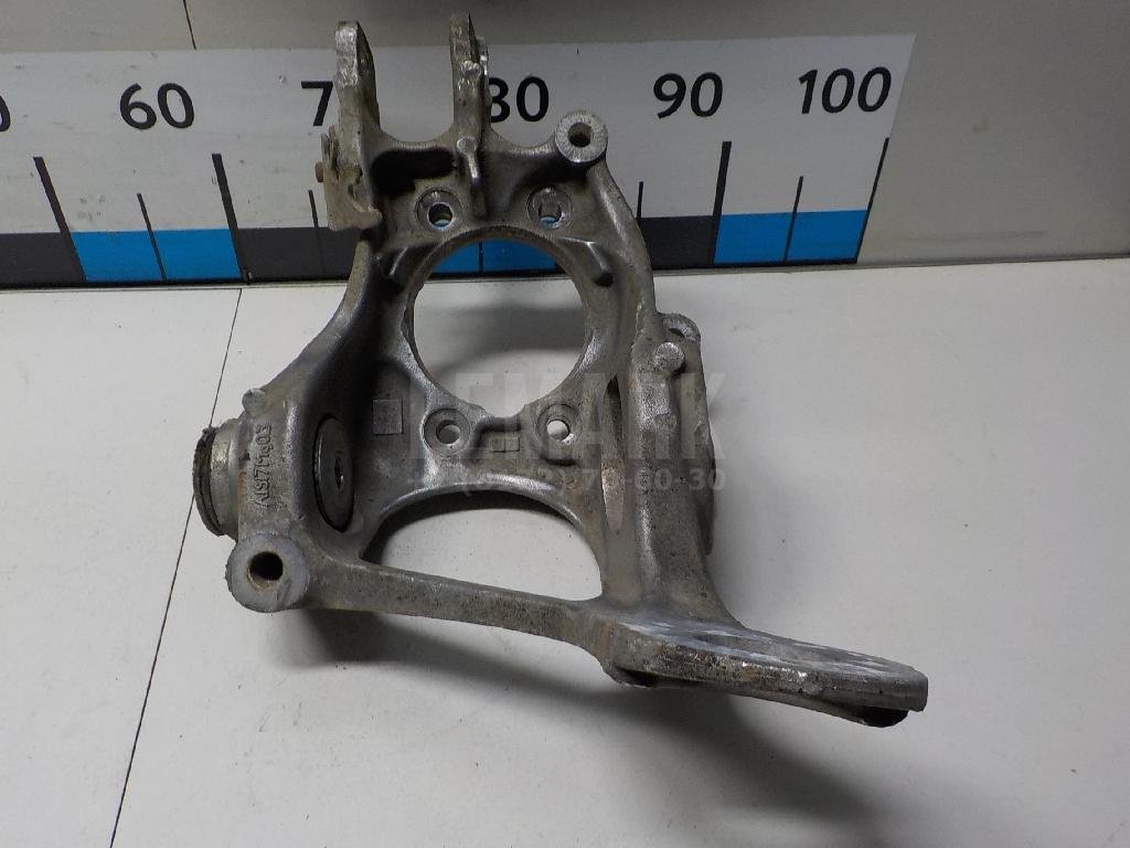 Кулак поворотный задний левый