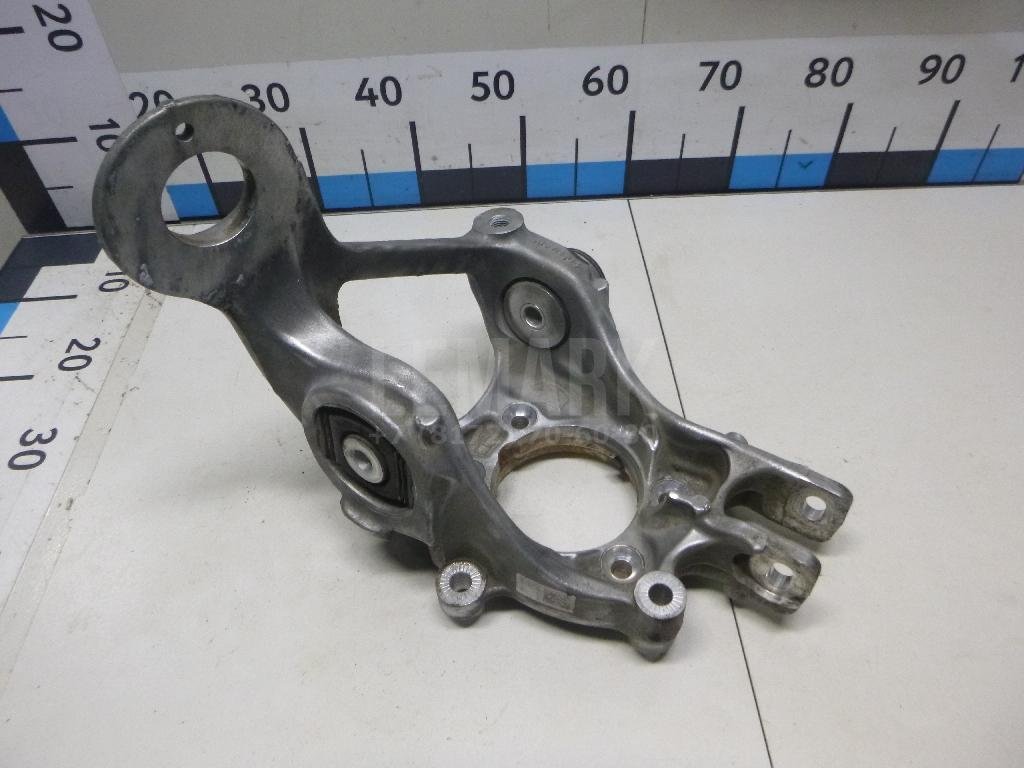 Кулак поворотный задний левый