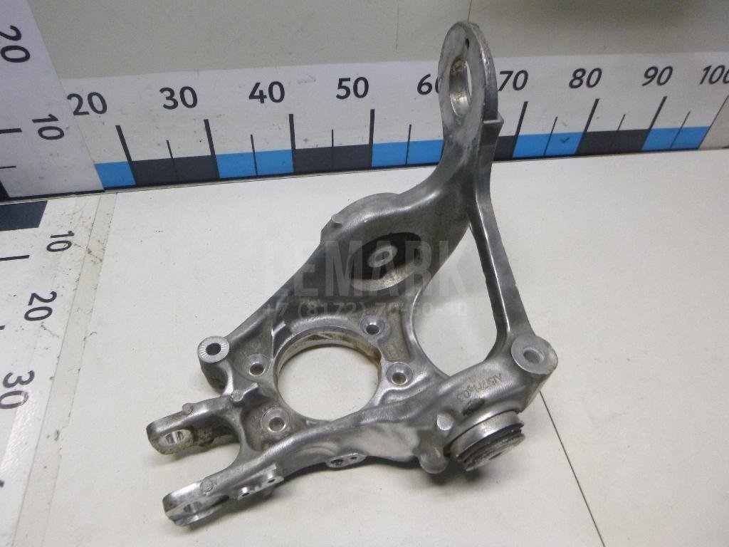 Кулак поворотный задний левый