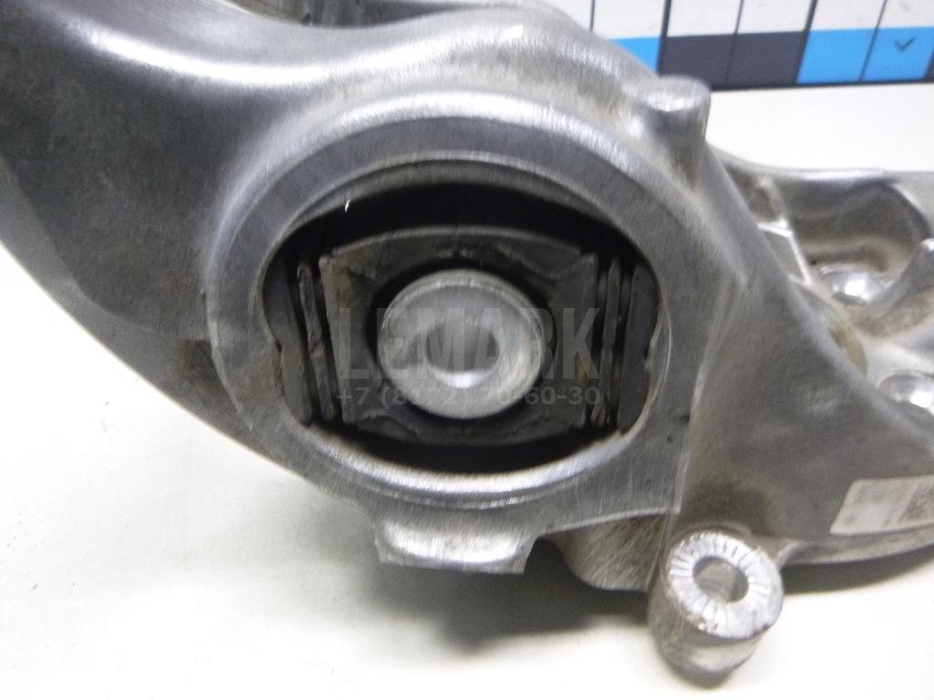 Кулак поворотный задний левый