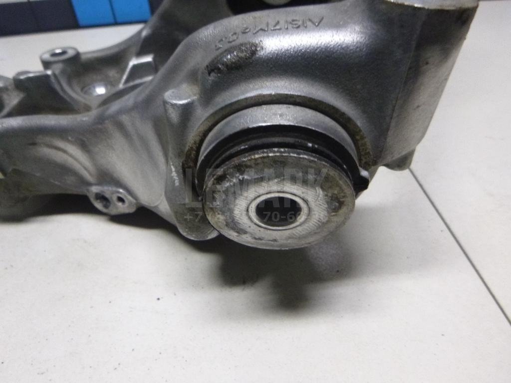 Кулак поворотный задний левый