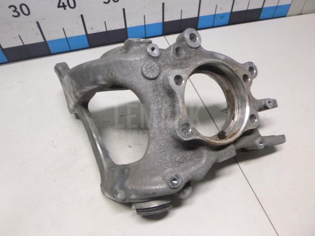 Кулак поворотный задний левый