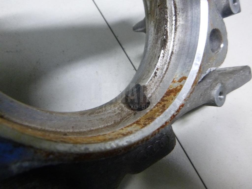 Кулак поворотный задний левый