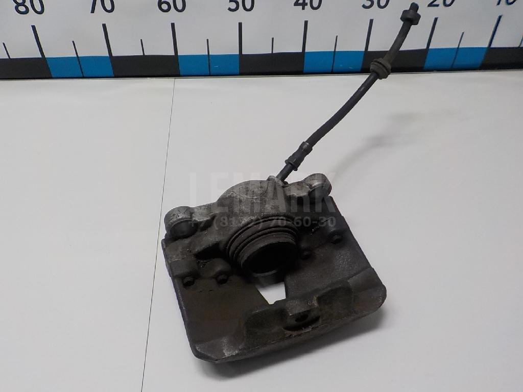 Суппорт тормозной передний левый