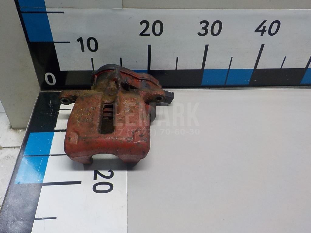 Суппорт тормозной задний левый