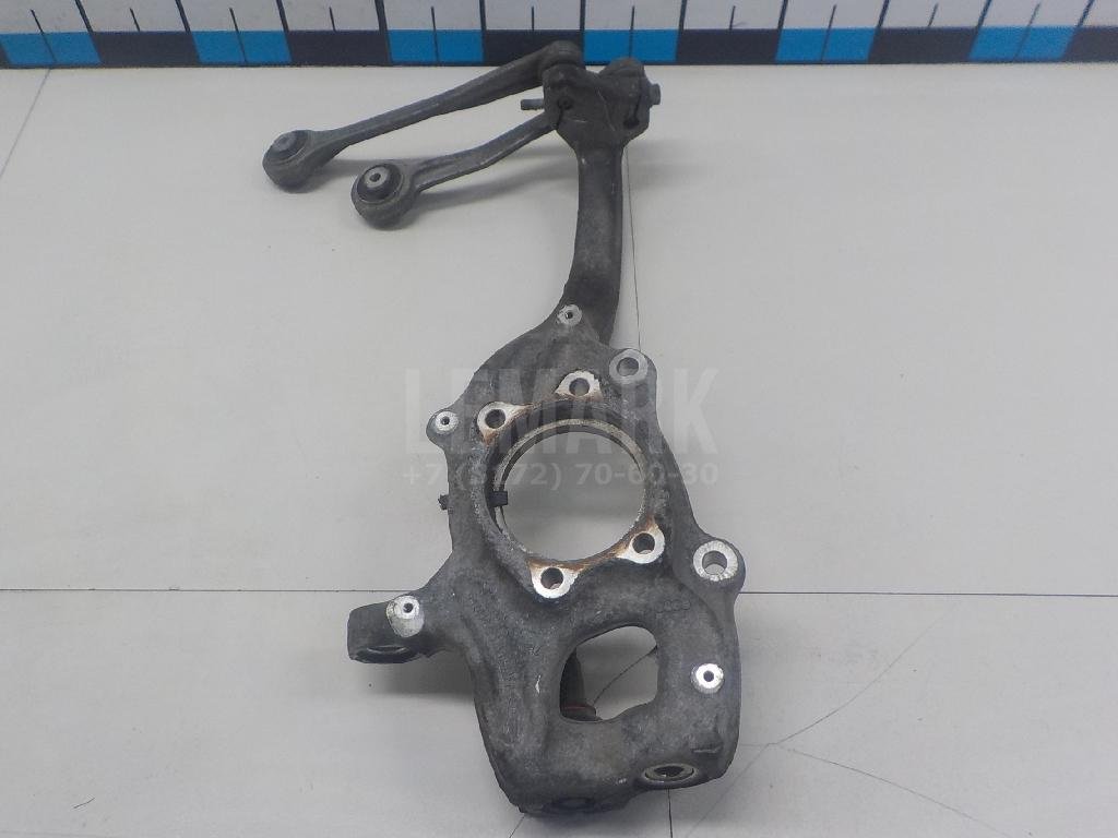 Кулак поворотный передний левый