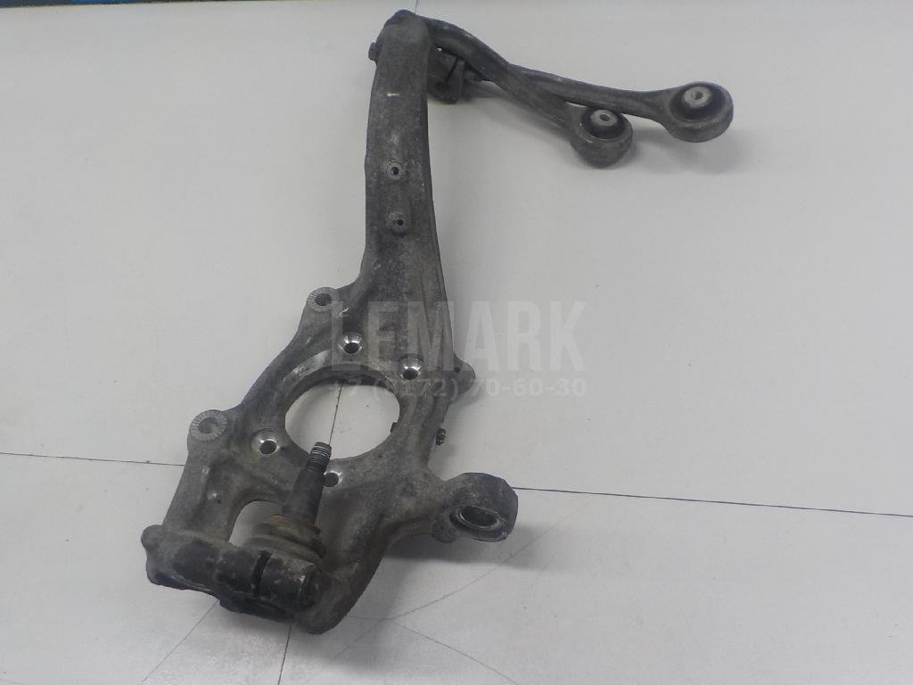 Кулак поворотный передний левый