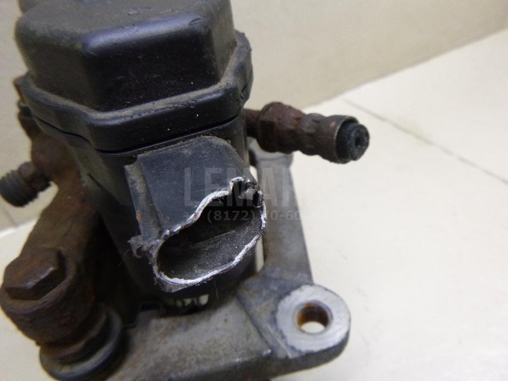 Суппорт тормозной задний левый