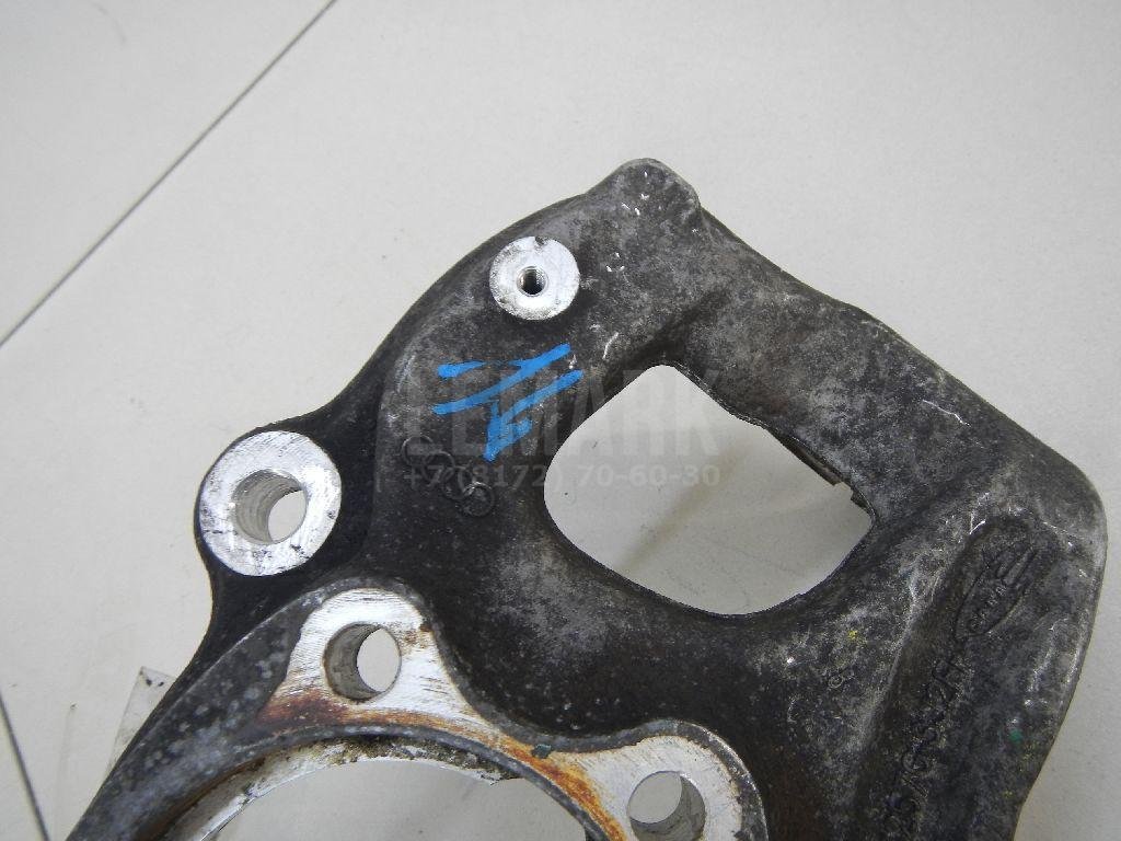 Кулак поворотный передний левый