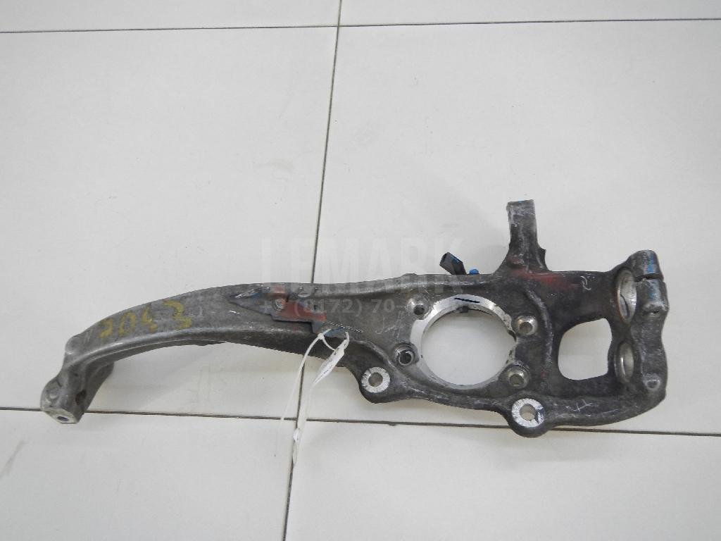 Кулак поворотный передний левый