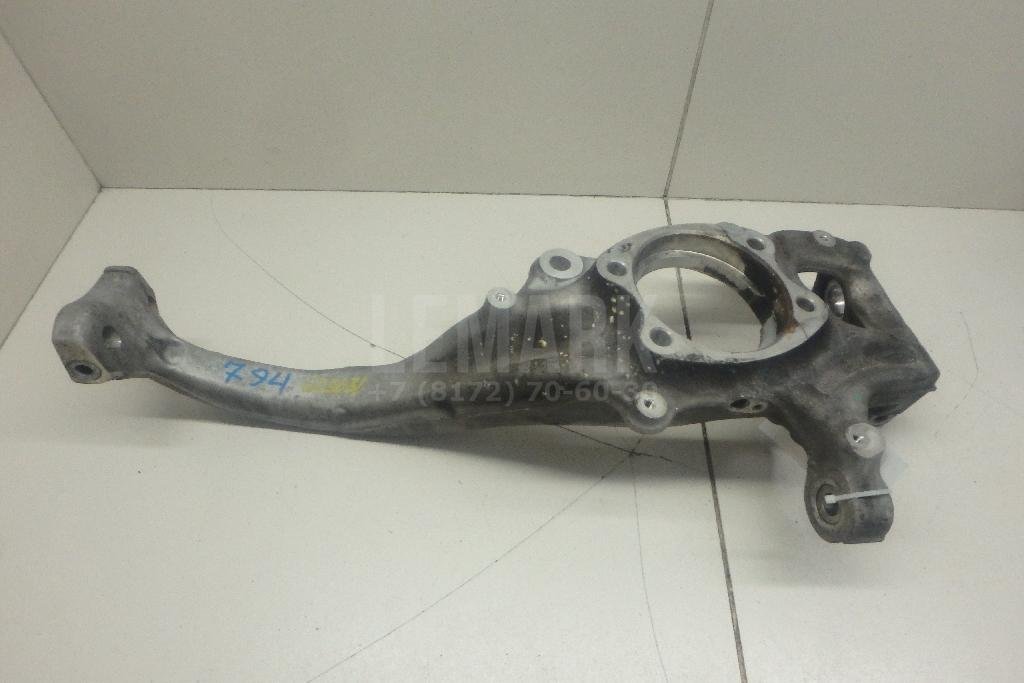 Кулак поворотный передний левый