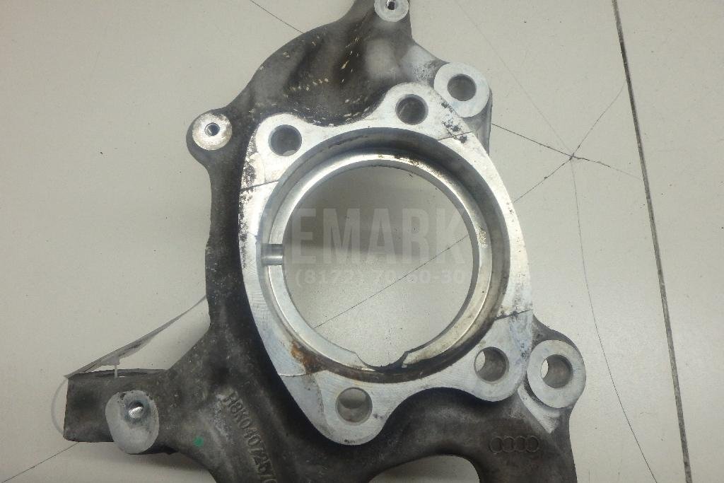 Кулак поворотный передний левый