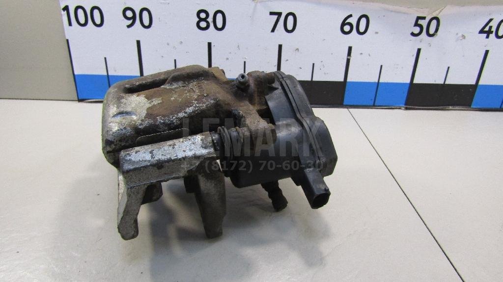 Суппорт тормозной задний левый