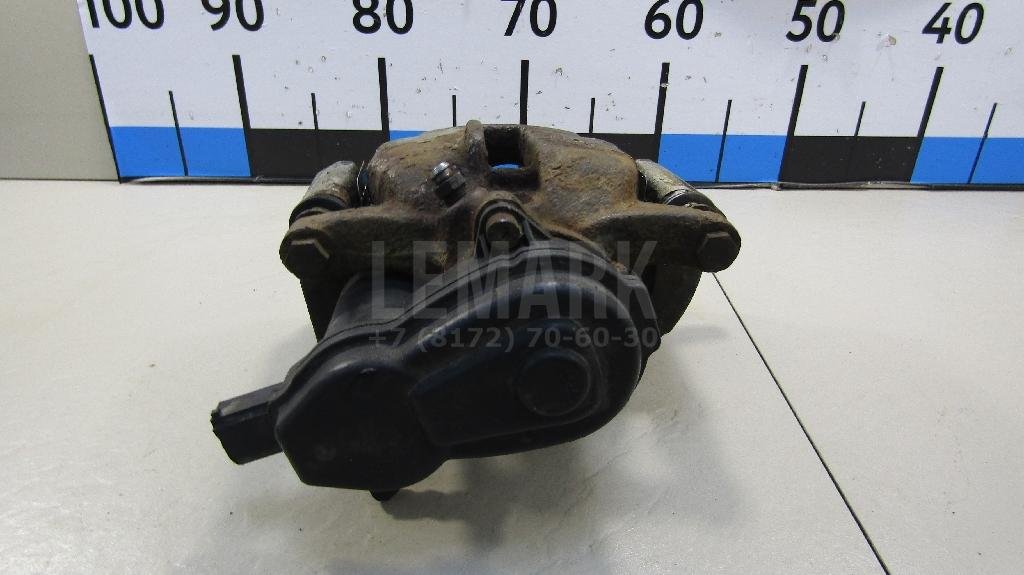 Суппорт тормозной задний левый