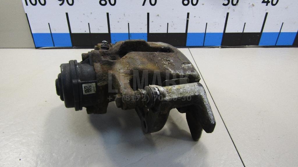 Суппорт тормозной задний левый