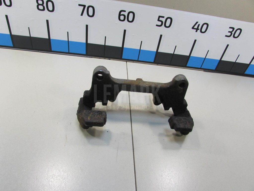 Скоба суппорта переднего